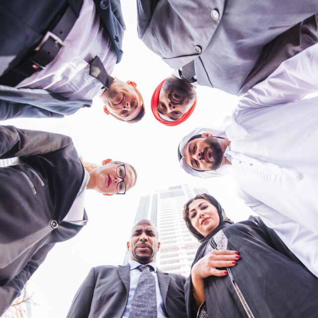 Multicultural business people meeting and talking about business - Multiracial business team meeting